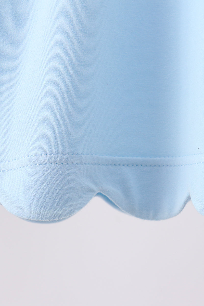 light blue flutter sleeve scalloped top
