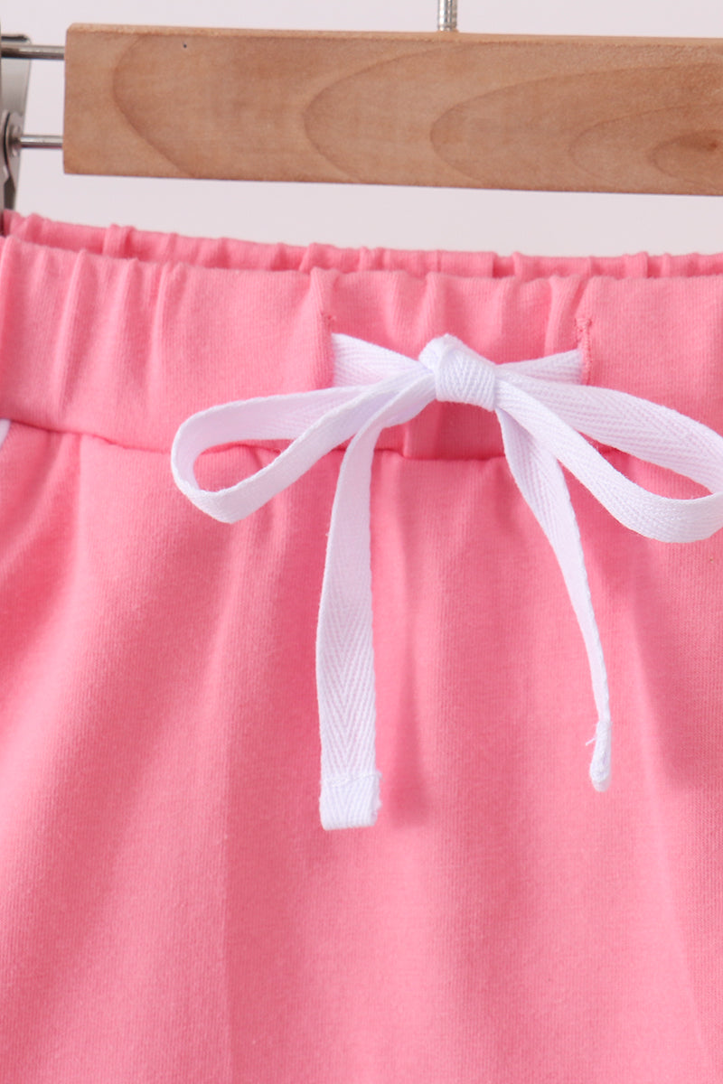 pink scallop hem bow skort
